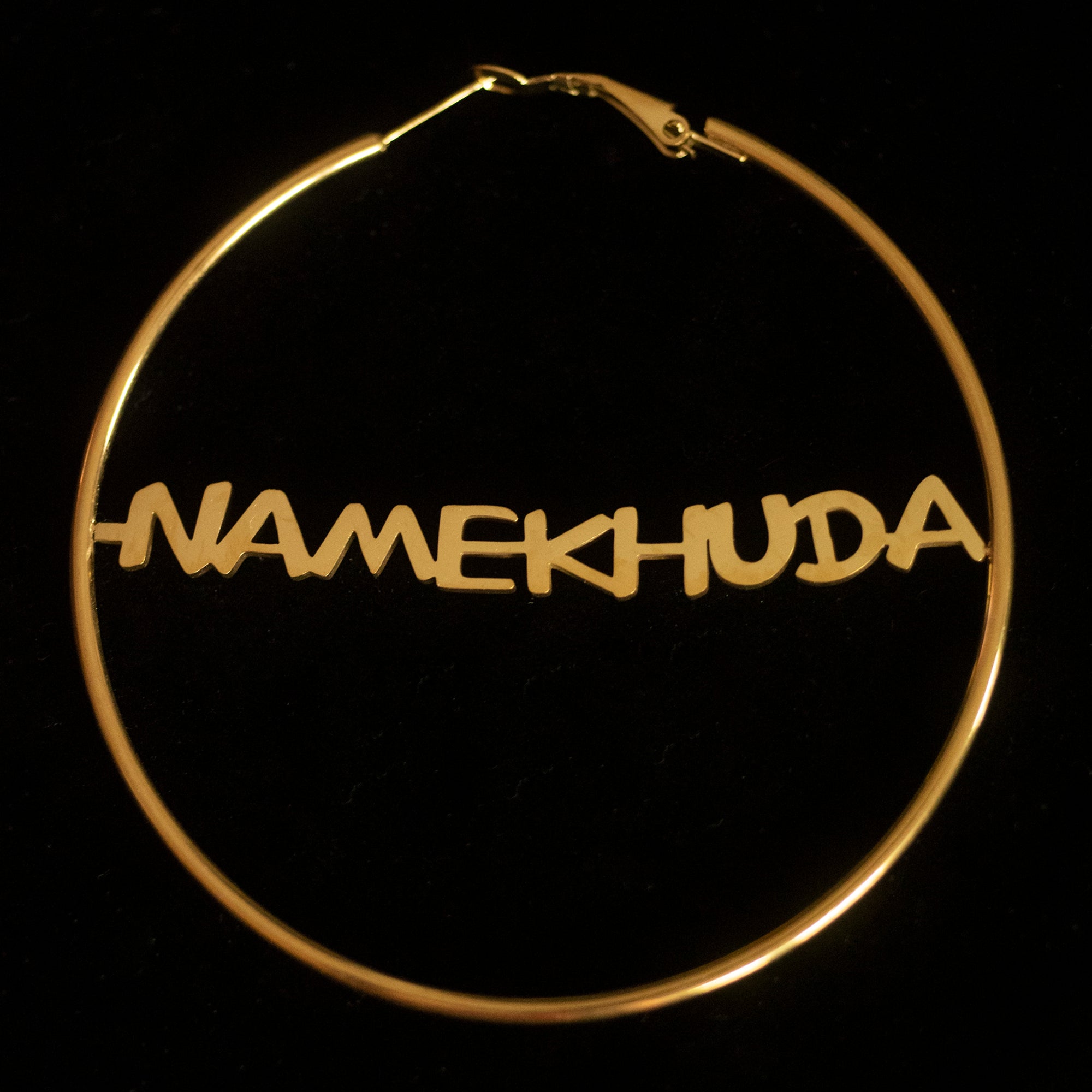 Hoops with the word 'Namekhuda' written in Latin alphabet against a black background.