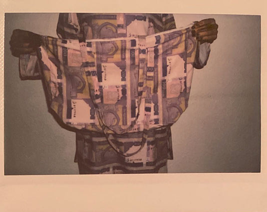 Polaroid of our 100 Afghani tote bag.