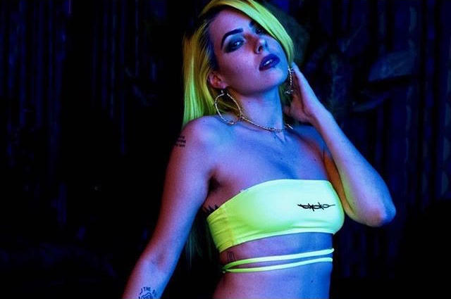 The Kabul House Essential Barb Wire Choker - Blingistan, person with bright hair and neon clothes wearing gold barb wire jewellery set.