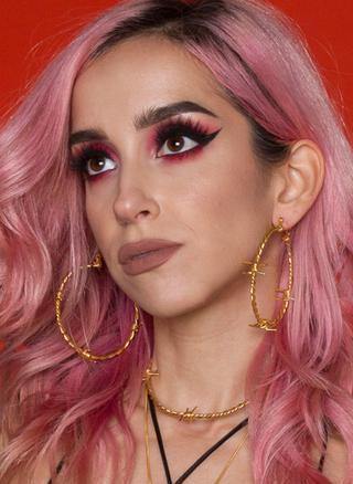 The Kabul House Essential Barb Wire Choker - Blingistan, person with pink hair and pink makeup wearing gold barb wire jewellery set.